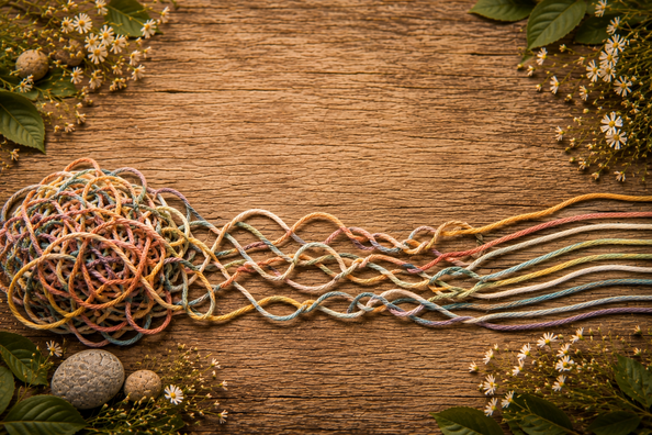 Tangled threads transforming into organised strands, symbolising executive functioning, ADHD, and gaining clarity.
